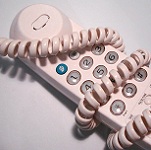 Picture of telephone with tangled cable for Your Expert Witness story